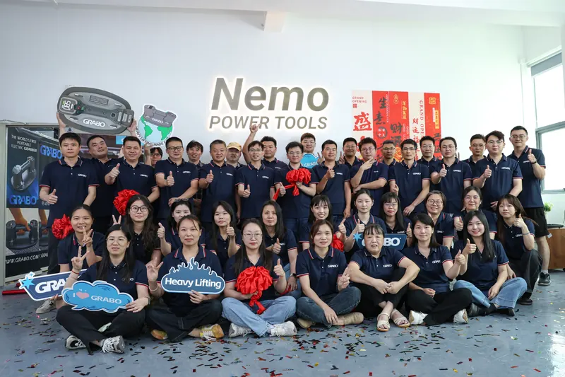 The Nemo team gathered outside the factory
