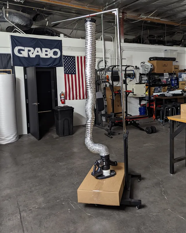The Las Vegas warehouse, with a GRABO banner and an American flag on the wall